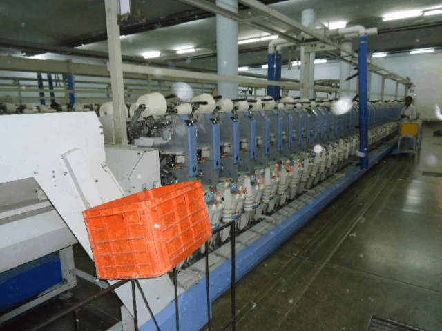 yarn auto coning machine at a yarn manufacturing company